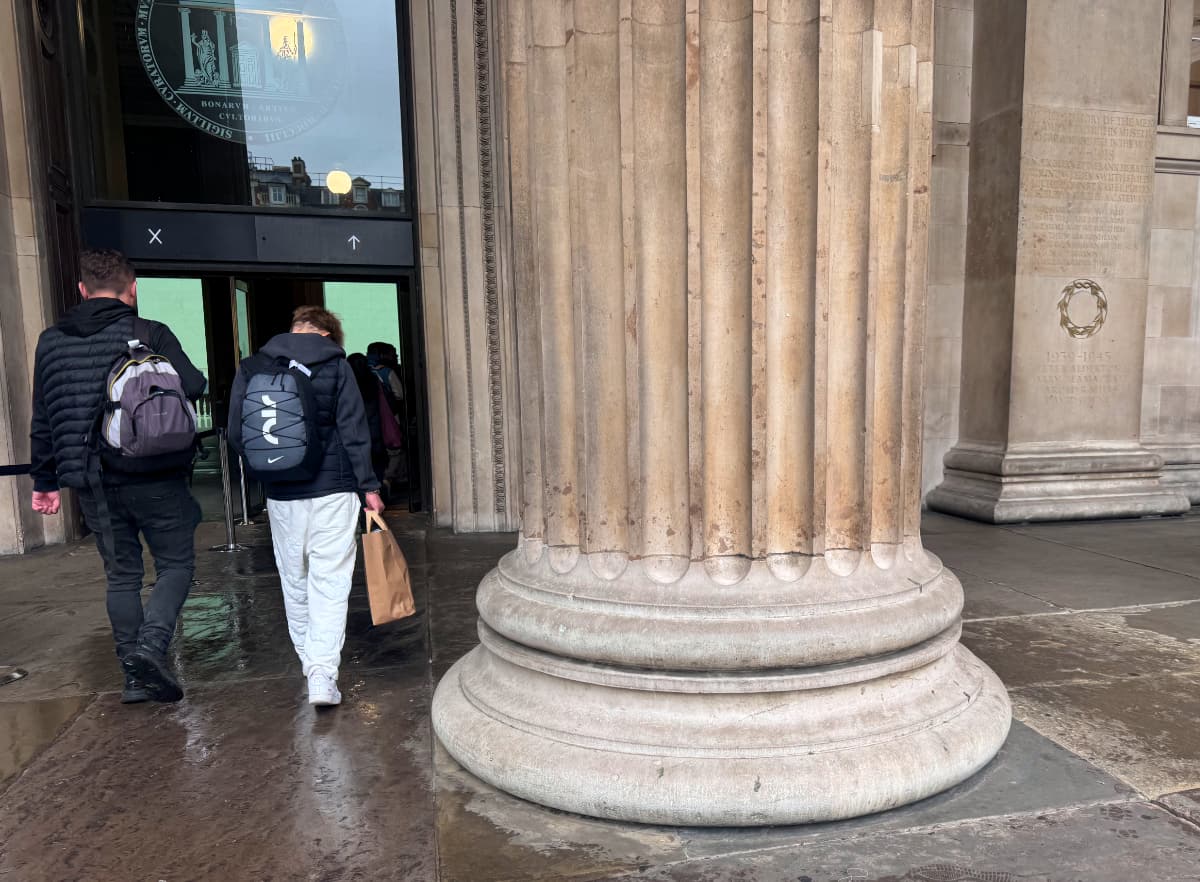 The main entrance of the British Museum, featuring the base of a large column
